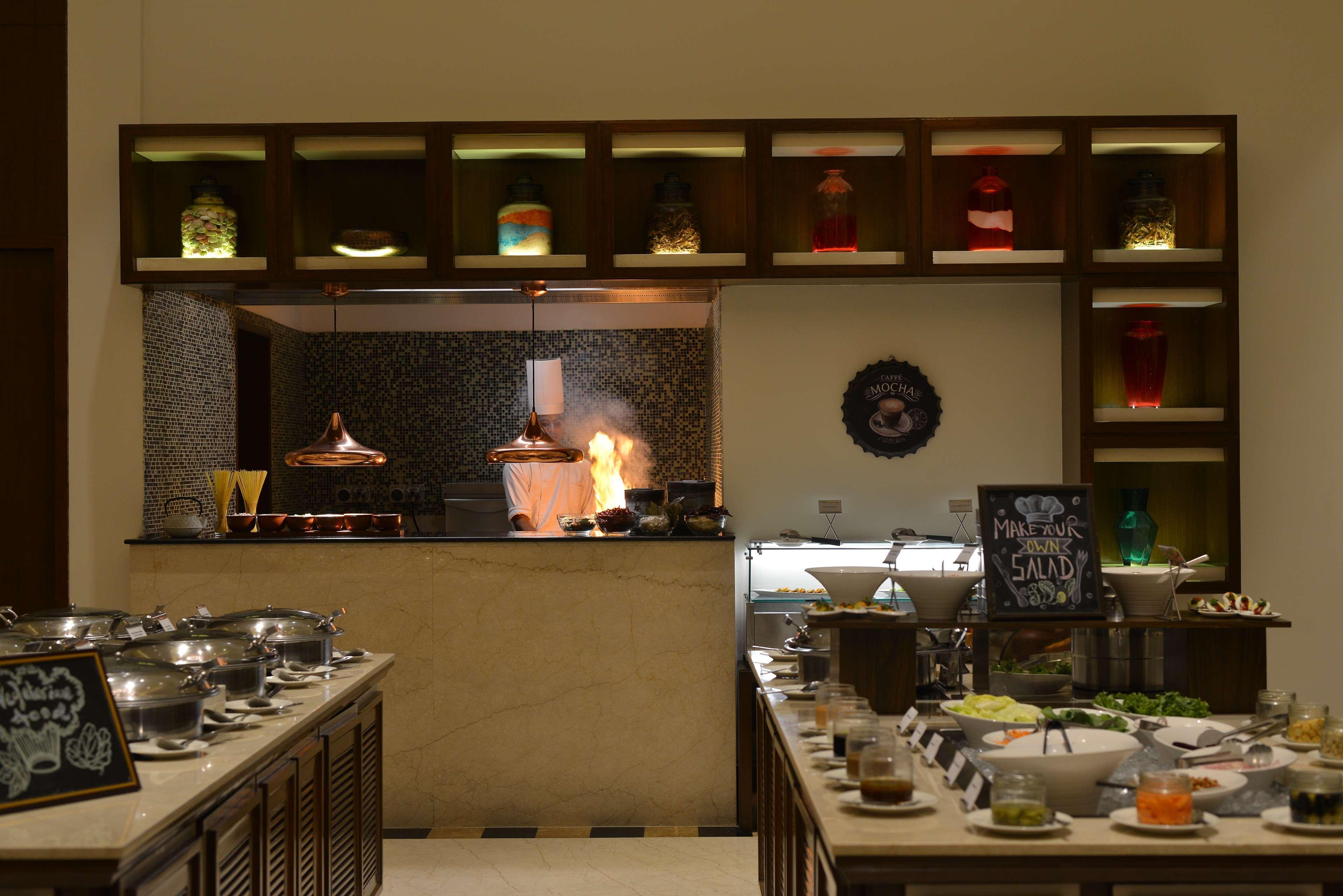 Ramada Plaza Chennai Hotel Exterior photo A live kitchen at a hotel