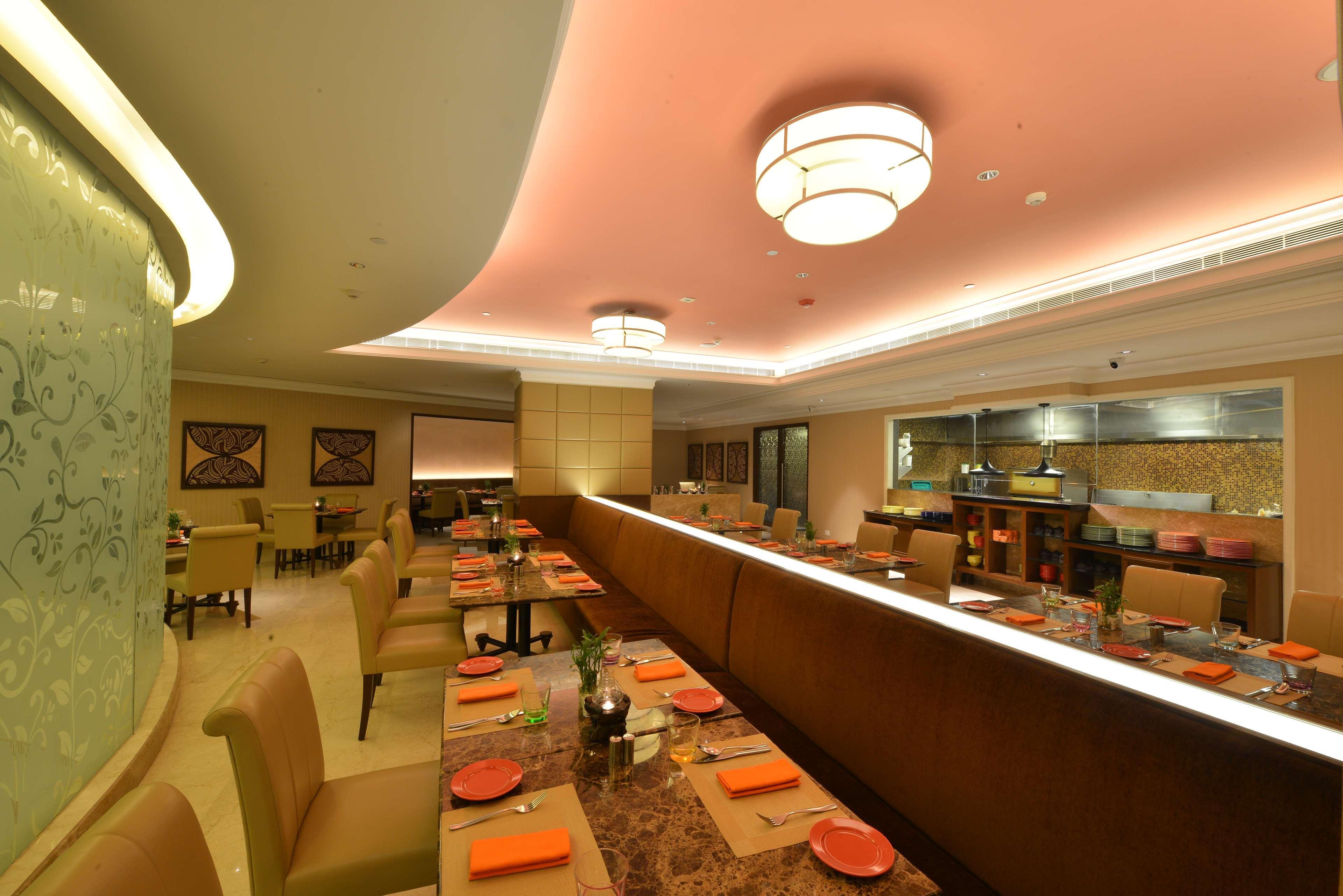 Ramada Plaza Chennai Hotel Exterior photo The interior of the restaurant
