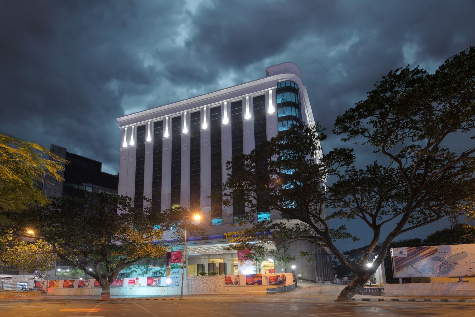 Ramada Plaza Chennai Hotel Exterior photo The hotel at night